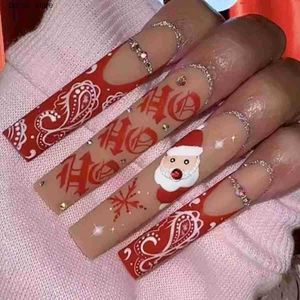 Valse nagels 24 stks Kerst exclusieve valse nagels Wearable Long Xmas Style Fake Nails Elk Snowflake Design Volledige dekking Press op Nagel Tips Y240419 Y240419
