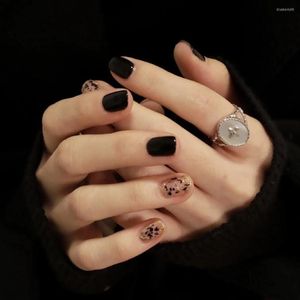 Faux ongles 24pcs faux noir or léopard style français avec colle type d'ongle court paragraphe mode manucure bouts d'ongles