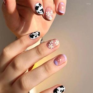 Valse nagels zwart wit onregelmatige hit kleurpatroon draagbare nagelkunst schattige bloemen paarse afneembare druk op met lijm