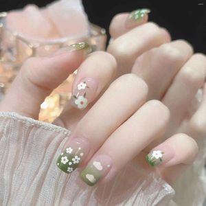 Faux ongles mignons petites fleurs vertes presse courte sur couverture complète début printemps brillant pour les amateurs de manucure et les blogueurs de beauté