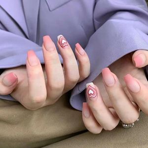Faux ongles mat dégradé rose presse sur Y2K amour coeur faux ongles longueur moyenne cercueil givré ballet couverture complète pour les femmes