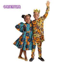 Familie Bijpassende Outfits Afrikaanse Familie Bijpassende Outfits voor Kinderen Zus Broer Meisjes Jurk en Jongens Broek Set Kinderen Ankara Print Kleding WYQ920 230614