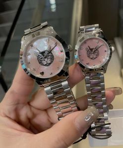 Famosa marca mujeres hombres pareja reloj de cuarzo atemporal entrelazado G madre perla shell dial patrón CAT Reloj acero inoxidable estrella corazón abeja encantos reloj de pulsera