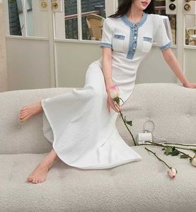Vestido de marca de marca famosa elegante y de moda 2024 Temprano en la primavera Nuevo dobladillo para mujer vestidos largos de punto largo