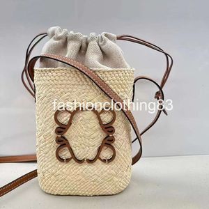 Beroemde ontwerper Bucket Bag Women Grass geweven Crossbody tas Love Hollowed Out Straw Bags Mini Tote Bags Fashion Beach Handtas Purse Mobiele telefoon Pocket Zomer