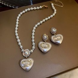 Beroemde ontwerper dubbele ring hanger ketting oorbellen 2 in 1 set hart parelvorm luxe mode sieraden bruiloft