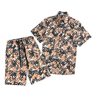 Chemise hawaïenne pour hommes de créateurs célèbres chemise décontractée pour hommes printemps et été lâche lettres de fleurs décontractées pantalons de plage ss00