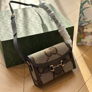 Famoso diseñador para hombre y mujer, bolsos cruzados, nueva moda no tejida, caja para teléfono móvil, bolso de marca italiana de lujo, hebilla de sillín, bolso de un solo hombro, billetera para pareja