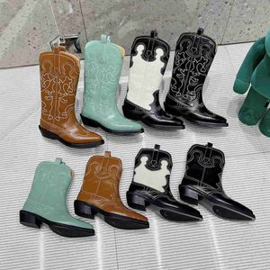 Chaussures de créateurs célèbres Bottes de cowboy occidentales À la mode Un incontournable pour l'automne et l'hiver Plein de design Style cool et cool Tenues tendance Grandes, fines et droites