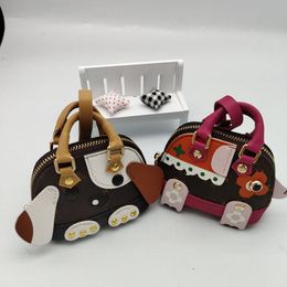 Famoso diseñador Unisex Key Wallet Dog Mujeres y hombres Mini Shell Bags Portable Elephant Monederos Marca de lujo Ladies Short Wallet con llavero Bolsas colgante