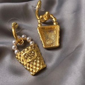 Célèbre marque de femmes boucles d'oreilles de haute qualité plaqué or 18 carats style rétro géométrie anneau pendentif boucle d'oreille boucle d'oreille bijoux cadeau de Saint Valentin