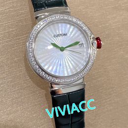 Célèbre femmes géométrique cuir cristal diamant lunette montre en acier inoxydable montres à quartz nacre coquille horloge 33mm