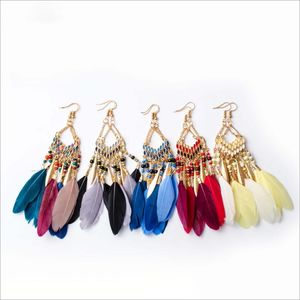 Longue chaîne frange plume balancent lustre bohème riz perles boucles d'oreilles pendantes pour femmes oreille crochet boucles d'oreilles bijoux en gros