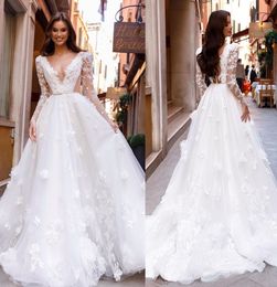 Elegante vestido de novia de una línea Apliques de encaje Mangas abullonadas Vestidos de novia Escote en V profundo Robe de mariee