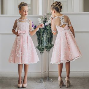 Fancy Blush Pink Communion Flower Girl -jurk met appliques halve mouwen knie lengte meisjes optochtjurk met lintbogen voor kerst 249r