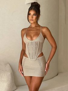 Fantoye tricoté sexy creux out femme en deux pièces sets noires spaghetti trap top mini jupe de vacances d'été élégant ensemble 2024 240523