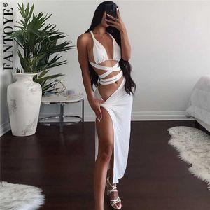 Fantoye vrouwen sexy tweedelige dresseset onregelmatige bandage crop top en hoge split midi rok pak witte nacht clubwear outfits x0709