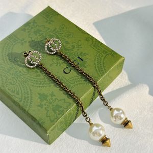 Moda 18 K chapado en oro borla diseñador letras Stud largo pendiente cuelga cristal geométrico lujo marca mujeres Rhinestone perla boda fiesta