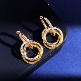 Mode -accessoires Carter met drie kleuren drie ringen oorbellen en dezelfde stijl prachtige diamant inleg meerdere draagmethoden voor oorbellen en oorbellen
