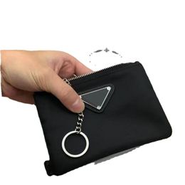 Accesorios de moda llavero de diseñador Bolsa de lona de nylon Hombres Mujeres Mini carteras Llaveros Monedero de bolsillo con cremallera negro Llaveros para amantes Titulares de tarjetas Llavero