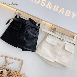 Mode bébé fille PU jupe en cuir court infantile enfant en bas âge sac ceinture jupe en cuir noir blanc bébé vêtements 1-7Y 240325