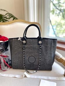 Bolso de moda diseñador bolso para mujer mochila escolar sarga de lana tela suave y metal dorado bolso de compras de playa bolso de moda para axilas pieza versátil de moda