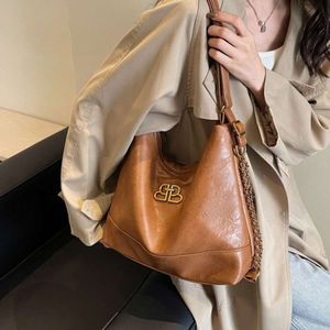 Les créateurs de sacs de mode vendent des sacs de marques populaires sac pour femme nouvelle chaîne de sac à dos