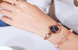 Pulsera de moda atractiva para mujer reloj creativo diamante relojes femeninos contratados pequeños perforación de cristal de estrella damas pulsador