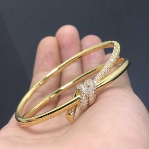 Modemerk armband knoop nieuw product met diamant v goud modeontwerp geavanceerd persoonlijkheid vlinder touw gewikkeld p70q