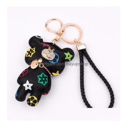 Marque de mode Classique Chic Porte-clés Femmes Hommes De Luxe Voiture Pendentif Unisexe Designer Bijou Bijoux Ours Chaîne Accessoires Strass Goutte Deli