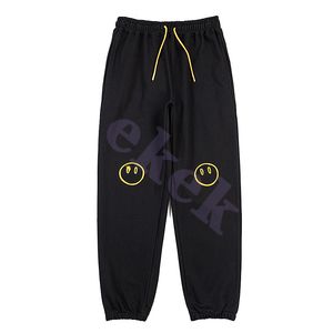 Modemerk heren broek smile gezicht borduurwerk vaste kleurbroek hiphop joggingbroek losse leggings casual joggingbroek zwart