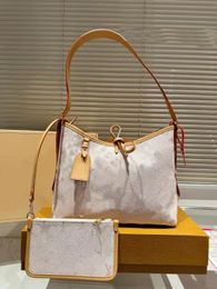 Fashion Carryall PM MM Sac à bandoulière de créateurs pour femmes avec sac à fermeture éclair détachable en cuir en cuir de luxe pour le sac à main de luxe.