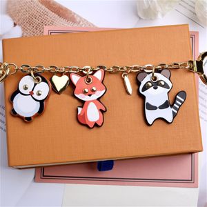 Mode Cartoon Sleutelhanger Tas Auto Hanger Metalen Haak Met Geschenkdoos Geschikt Voor Mannen Dames Kinderen Designer Keychain227T