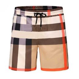 Moda clásica para hombre para mujer diseñadores pantalones cortos verano moda streetwears ropa secado rápido traje de baño tablero de impresión playa 23ess