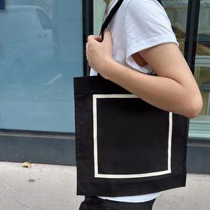 Clásicos de la moda Bolsas de almacenamiento de lona negra Bolso de un solo hombro Viajes y viajes de negocios Bolso para estudiantes Artículos populares en países europeos y americanos.