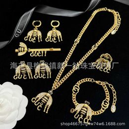 Collection de mode 2023 nouveau luxe de haute qualité bijoux de mode pour nouvelle abeille collier Double gland Bracelet boucle d'oreille anneau épingle à cheveux en laiton