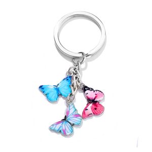 Mode coloré émail papillon porte-clés animaux insectes clé de voiture femmes sac accessoires bijoux cadeaux en gros