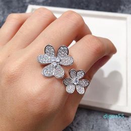 Mode Cuivre Plaqué Brillant Trèfle Ouvert Double Fleur Bague Femmes Or Rose Anneaux En Acier Inoxydable Pour Cadeau De Fête Bijoux pour femmes300o