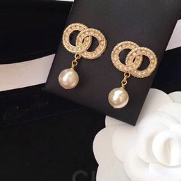 Mode boucles d'oreilles pendantes boucles d'oreilles design pour les femmes fête amoureux de mariage cadeau bijoux avec sac en flanelle