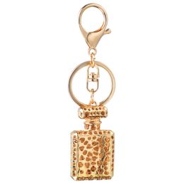 Design de mode porte-clés bouteille de parfum porte-clés pour femmes créatif cristal strass diamant métal voiture porte-clés chaîne sac pendentif cadeau bon