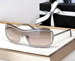 Diseñador de moda 71556 gafas de sol para mujer conjunto de diamantes de imitación rectángulo de metal sin marco gafas envolventes al aire libre elegante estilo encantador Anti-Ultravioleta viene con estuche