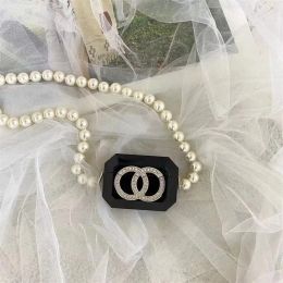 Designer de mode Airpods Cases Sac Casque Accessoires sans fil Casual Luxe Bluetooth Casque Cas avec chaîne de perles 2311293PE