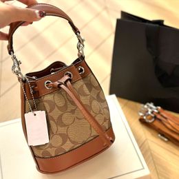 Sac de créateur de mode Nouveau classique et délicat joli caramel tempérament élégant tout taille 17X18 mini sac seau sac à bandoulière à main