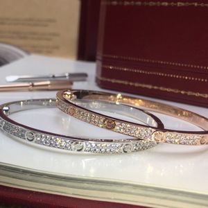 Modeontwerper armband voor vrouw mannen 18K gouden koppel armband roestvrij staal dubbele rij diamant luxe sieraden verborgen inlegproces nooit vervagen resistent armband