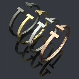 Créateur de mode Marque Double T Bracelet Couple Manchette en acier inoxydable Haute Qualité 18k Or Designer Bracelet Bijoux pour femmes et hommes