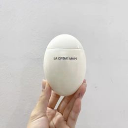 Diseñador de moda Marca LE LIFT crema de manos 50 ml LA CREME MAIN crema de manos de huevo blanco negro cuidado de la piel