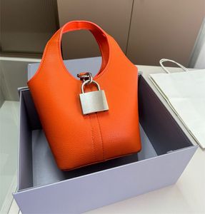 Diseñador de moda Cubo Elegante cerradura cerrojo Bolso de mano naranja Bolso de cuero para mujer Mini bolso de mano de lujo Bolso de vestido de fiesta de boda para mujer