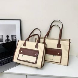 Sac en toile de créateur de mode Paris Lettre d'été Logo Design Tote's Tote's grande capacité Sac de plage haut de gamme décontracté grand et petites tailles sans boîte 7a qualité 2024