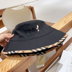Sombrero de pescador de diseñador de moda, moda simple para hombres y mujeres con la misma tendencia de alta calidad en todos los sombreros de calle