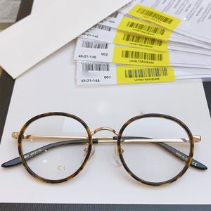 Gafas de diseñador de moda Las gafas para miopía con montura redonda retro se pueden cambiar. Las lentes para miopía también se pueden decorar con un tamaño: 48 pares 21-145.